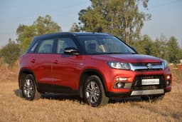 With its short overhangs, squared-out wheel arches and mildly raked tail, the Vitara Brezza looks like a scaled-down SUV.